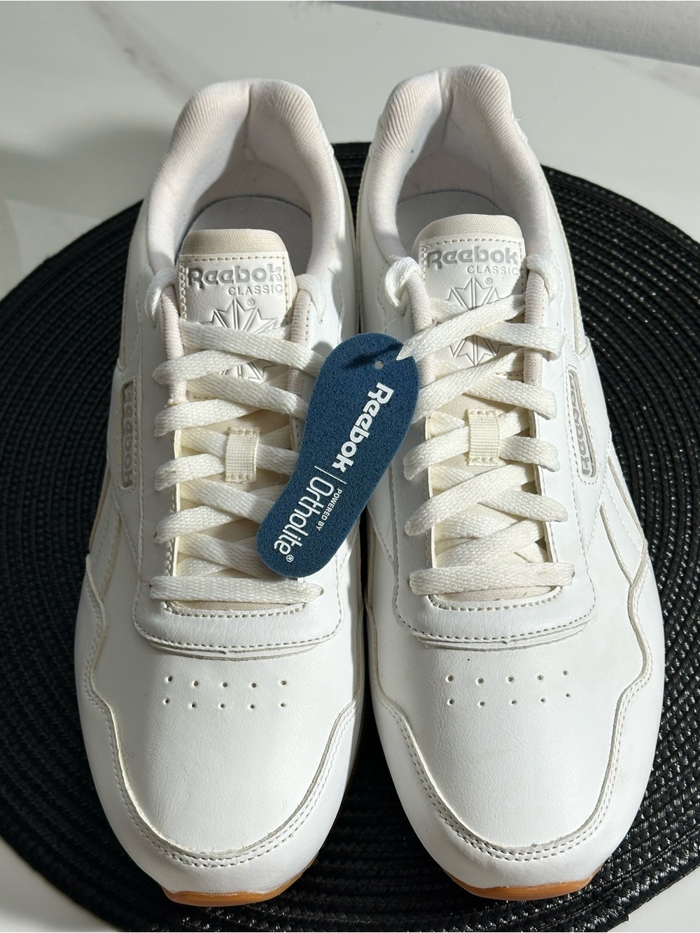 Reebok Men's White Leather Sneakers with Blue Tag